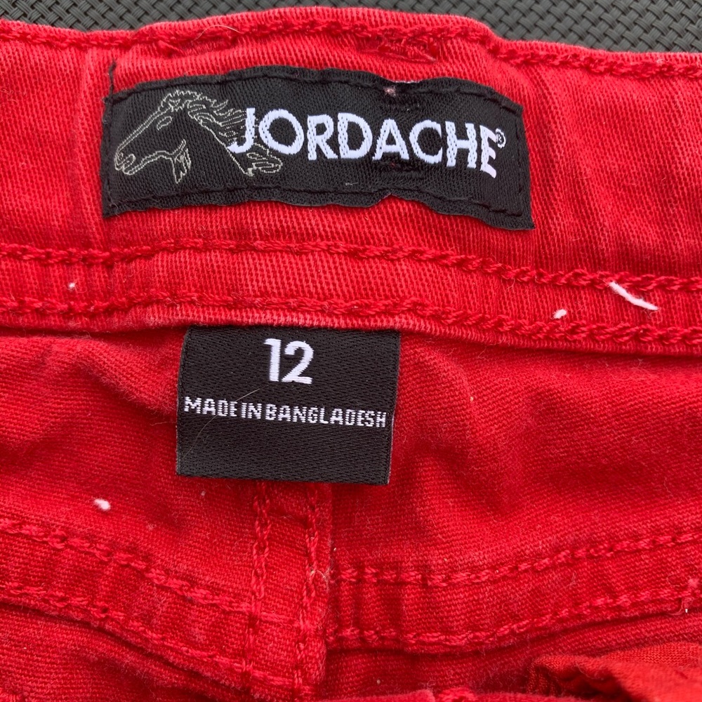 Shorts, bright color red cute design on the front.